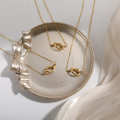Solstice Knot Necklace - Ivory Embers